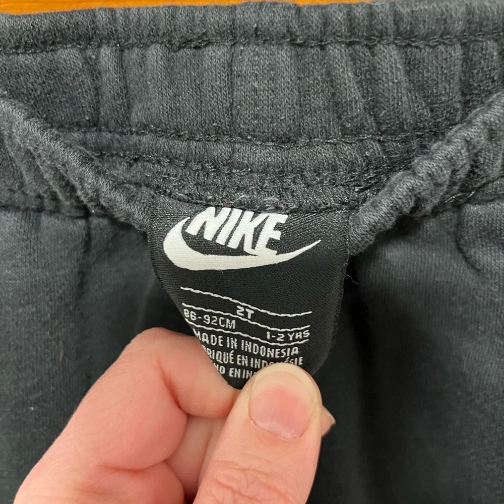 Nike Kids Black Sweatpants with White Logo